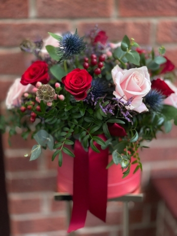 Festive Red Hat Box full of Seasonal Flowers